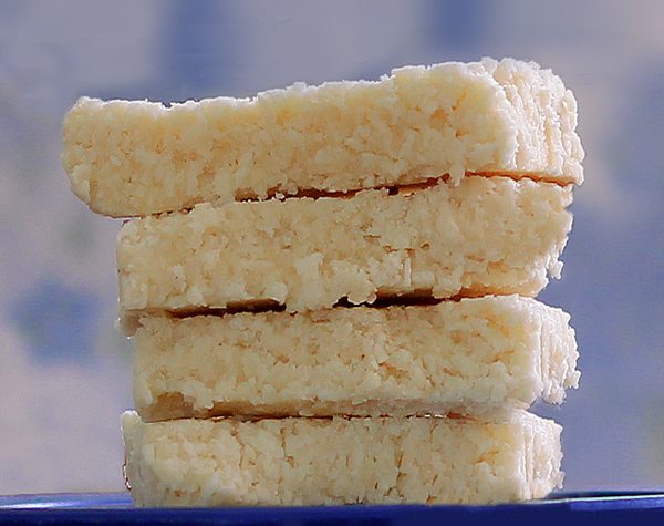 COCONUT CRACK BARS - 1 cup shredded coconut, 1/2 tsp vanilla extract, 1/8 tsp salt, 1/4 cup... Full recipe: https://lett-trim.today/2012/08/30/no-bake-coconut-crack-bars/ @choccoveredkt