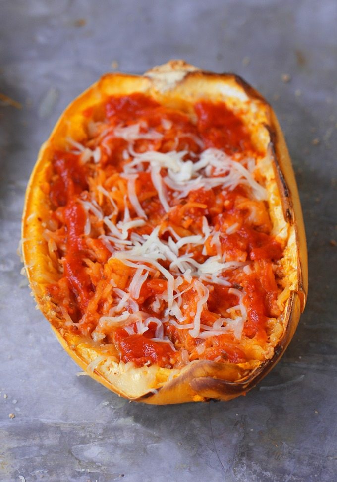 Cheesy Baked Spaghetti Squash Parmigiana - 5 ingredients, simple comfort food... A satisfying & super healthy weeknight meal, without all the extra fat and calories weighing you down. @choccoveredkt https://lett-trim.today/2016/03/10/spaghetti-squash-parmigiana-recipe-healthy-dinner/ Cheesy Baked Spaghetti Squash Parmigiana - 5 ingredients, simple comfort food... A satisfying & super healthy weeknight meal, without all the extra fat and calories weighing you down. @choccoveredkt https://lett-trim.today/2016/03/10/spaghetti-squash-parmigiana-recipe-healthy-dinner/