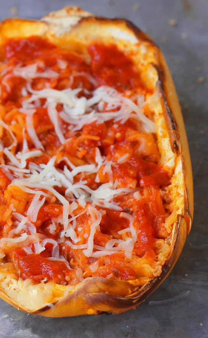 Cheesy Baked Spaghetti Squash Parmigiana - 5 ingredients, simple comfort food... A satisfying & super healthy weeknight meal, without all the extra fat and calories weighing you down. @choccoveredkt https://lett-trim.today/2016/03/10/spaghetti-squash-parmigiana-recipe-healthy-dinner/ Cheesy Baked Spaghetti Squash Parmigiana - 5 ingredients, simple comfort food... A satisfying & super healthy weeknight meal, without all the extra fat and calories weighing you down. @choccoveredkt https://lett-trim.today/2016/03/10/spaghetti-squash-parmigiana-recipe-healthy-dinner/