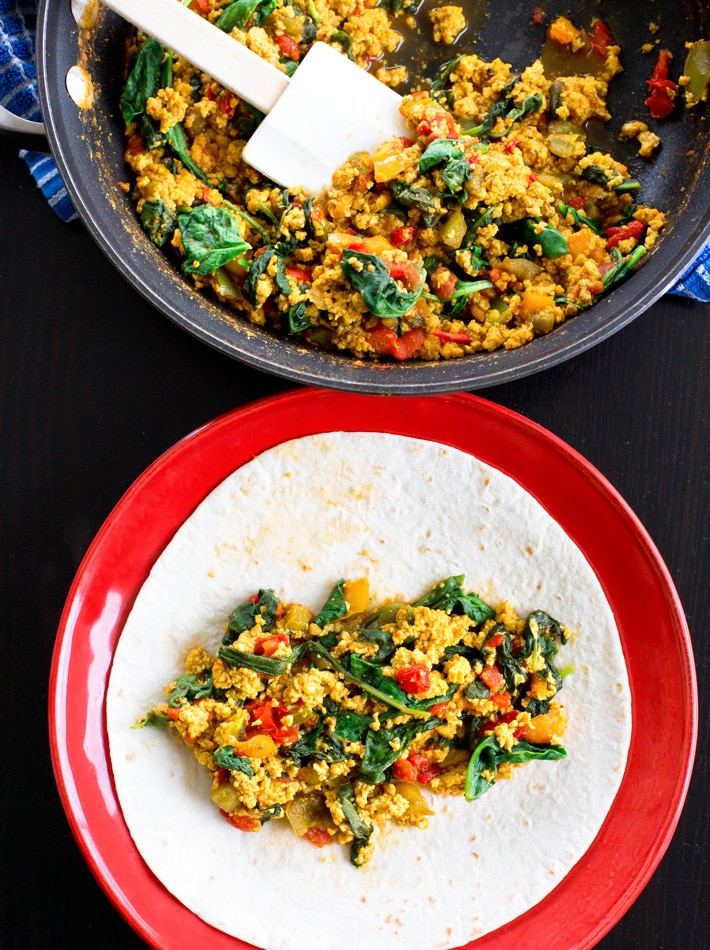 Making And Rolling Up Breakfast Burritos Making And Rolling Up Breakfast Burritos