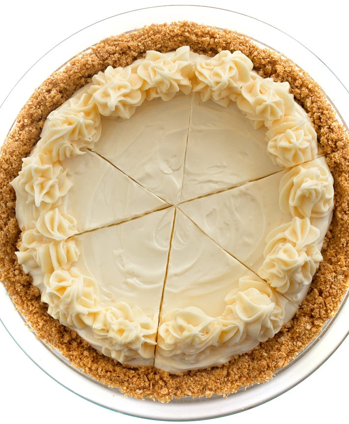 Whole Cheesecake Sliced Whole Cheesecake Sliced decorated with piped frosting