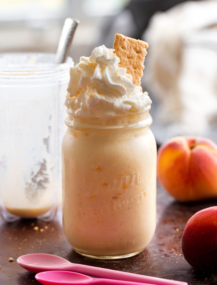 Healthy Peach Smoothie With Frozen Yogurt Healthy Peach Smoothie With Frozen Yogurt, topped with whipped cream and graham cracker crumbs