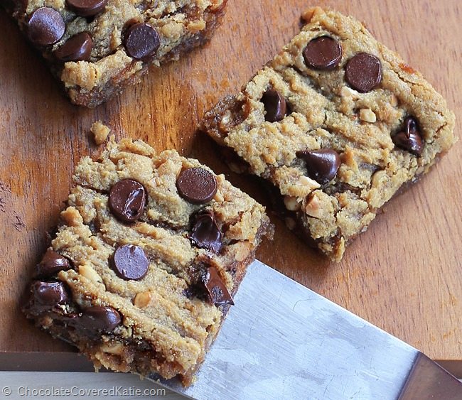 GOOEY CHOCOLATE CHIP PEANUT BUTTER BARS - Crazy addictive recipe... like the lovechild of a chocolate chip cookie and a Reeses peanut butter cup! https://lett-trim.today/2015/03/18/chocolate-chip-peanut-butter-bars/ @choccoveredkt GOOEY CHOCOLATE CHIP PEANUT BUTTER BARS - Crazy addictive recipe... like the lovechild of a chocolate chip cookie and a Reeses peanut butter cup! https://lett-trim.today/2015/03/18/chocolate-chip-peanut-butter-bars/ @choccoveredkt
