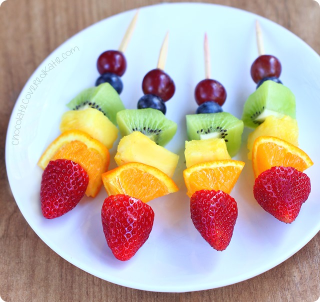 Rainbow fruit kabobs from @choccoveredkt. Easy to make & kid-friendly snack. https://lett-trim.today/2015/05/15/rainbow-fruit-kabobs/