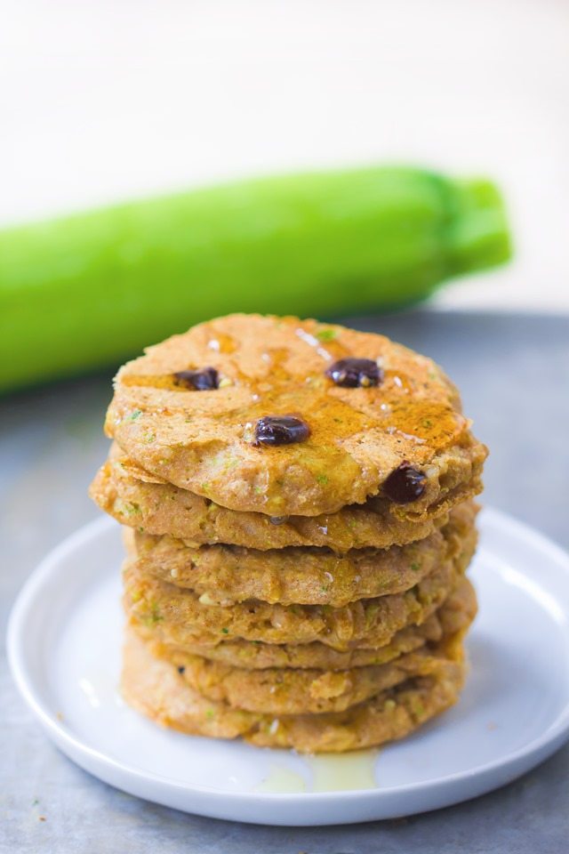 A giant stack of extra fluffy zucchini pancakes, stuffed with melty gooey chocolate chips and covered in hot maple syrup - These disappear so quickly whenever I make them: https://lett-trim.today/2015/08/10/zucchini-pancakes-healthy-vegan/