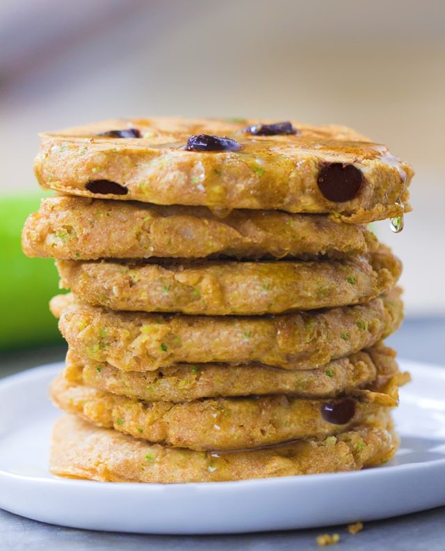 A giant stack of extra fluffy zucchini pancakes, stuffed with melty gooey chocolate chips - These disappear so quickly whenever I make them: https://lett-trim.today/2015/08/10/zucchini-pancakes-healthy-vegan/ A giant stack of extra fluffy zucchini pancakes, stuffed with melty gooey chocolate chips - These disappear so quickly whenever I make them: https://lett-trim.today/2015/08/10/zucchini-pancakes-healthy-vegan/